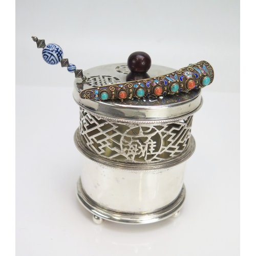 533 - A Chinese silver gilt, turquoise and enamel brooch in the form of a finger guard, the filigree frame... 
