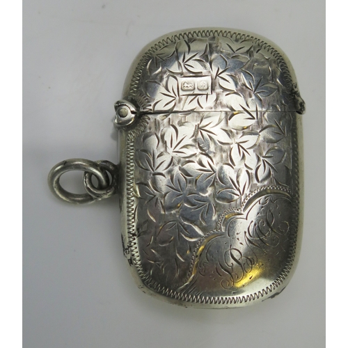 543 - An Edward VII silver vesta case, maker E J Trevitt & Sons, Chester, 1902, with chased foliate decora... 