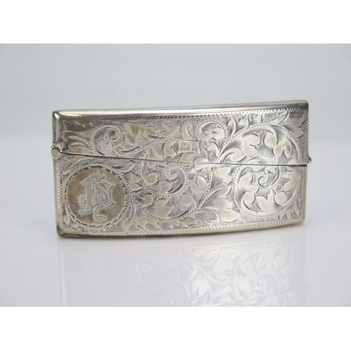 547 - An Edward VII silver card case, maker Joseph Gloster, Birmingham, 1902, monogrammed, with chased fol... 