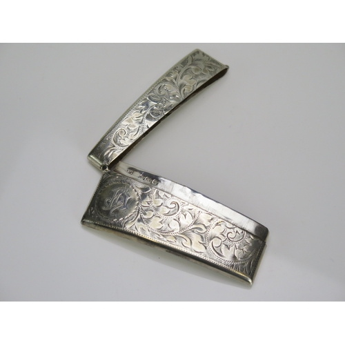547 - An Edward VII silver card case, maker Joseph Gloster, Birmingham, 1902, monogrammed, with chased fol... 