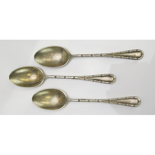 549 - Three Edward VII silver teaspoons, maker Atkin Brothers, Sheffield, 1903, the stems with bamboo patt... 