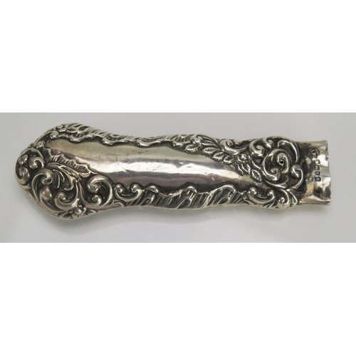 576 - An Edward VII silver paper knife handle, London, 1908, 10.5cm long