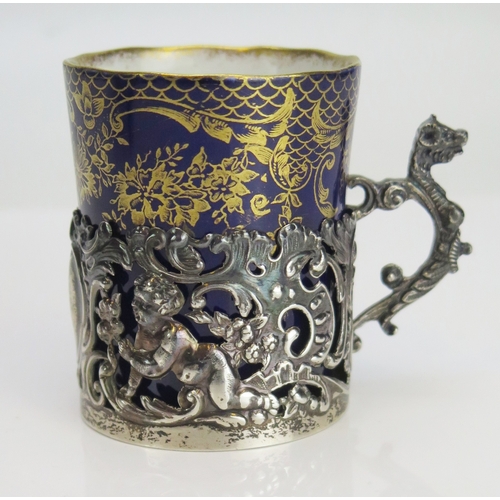 581 - A late Victorian silver coffee can holder, maker possibly William Comyns & Sons Ltd., Birmingham, 18... 