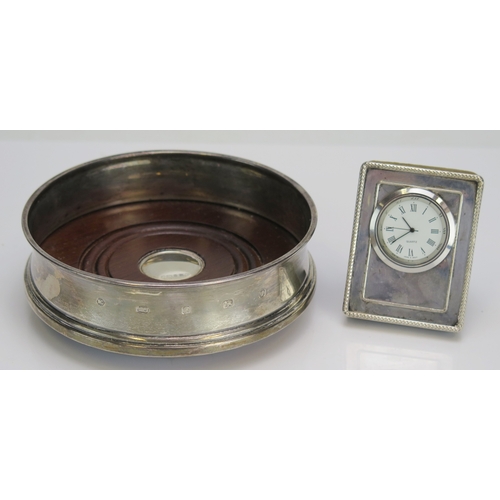 594 - An Elizabeth II silver coaster, maker Carrs of Sheffield, Sheffield, 2008, 12.5cm diameter, together... 
