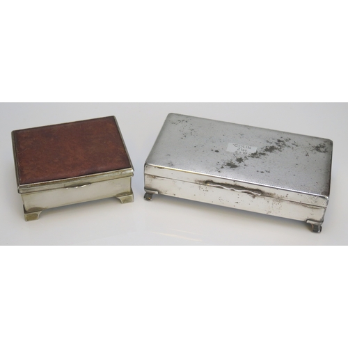 597 - Two silver plated cigarette cases of rectangular outline, 10cm and 17cm wide.