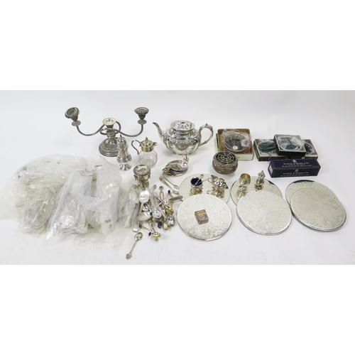 599 - A collection of assorted plated wares including teapot, twin branch candelabra, flatwares, bottle co... 