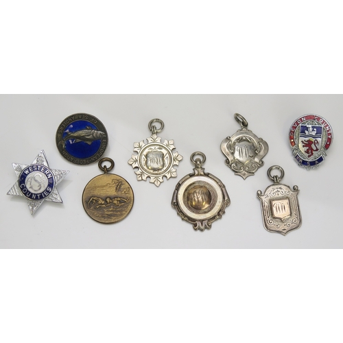 603 - Four assorted silver fobs/medallions, and other lapel badges, total weight of silver 34gms, 1.11ozst