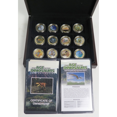 665 - A cased set of Westminster mint Age of Dinosaurs collector's coins with certificates