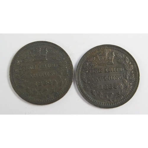687 - Two Victoria 1884 one third of a farthing coins