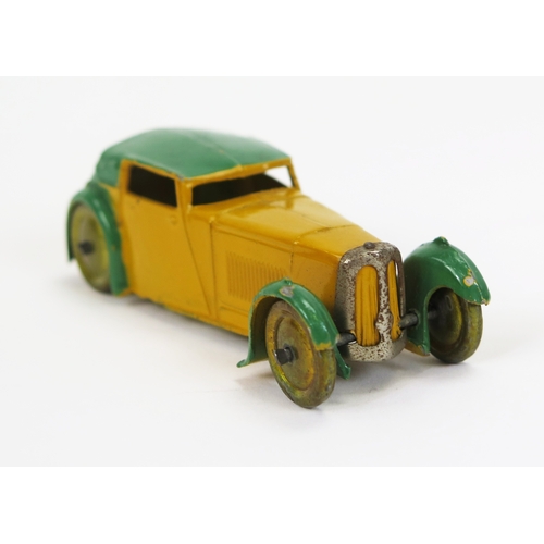 1336 - Dinky Toys Pre-War Hornby Series 22b Closed Sports Coupe in yellow with green roof and wheel arches,... 