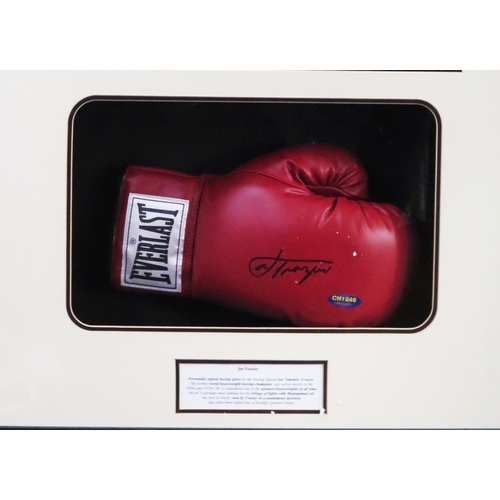 13 - Joe Frazier (smoking Joe) signed boxing glove in a mounted display frame with black and white photog... 