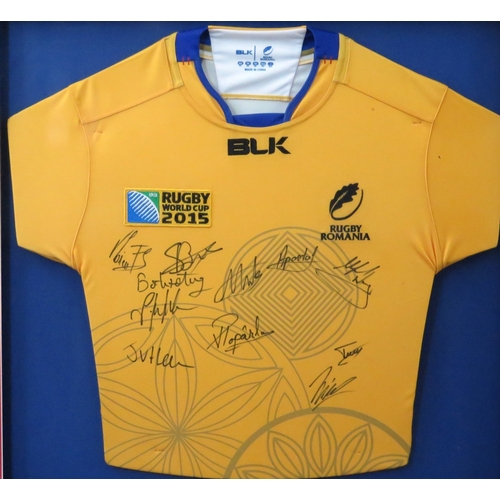 17A - A signed Romanian rugby shirt from the 2015 Rugby World Cup, mounted, framed and glazed.