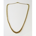 A fancy graduated chain link necklace, 55cm long, stamped 375, 13.26g