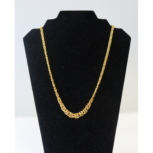 A fancy graduated chain link necklace, 55cm long, stamped 375, 13.26g