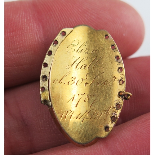 A Georgian precious yellow metal memorial clasp, the decorative glazed ...