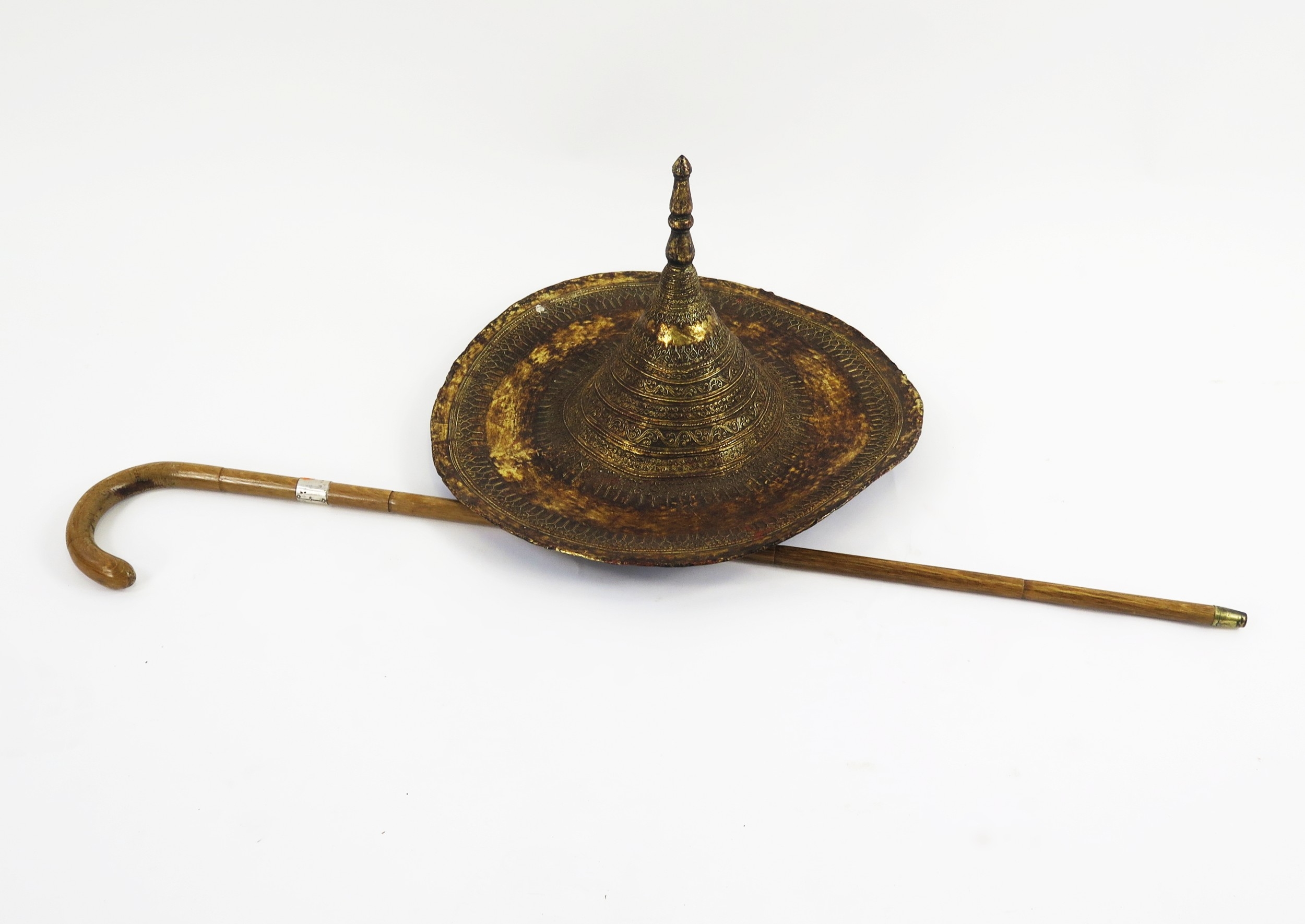 A Burmese / Cambodian woven cane and gilt decorated hat, of conical ...