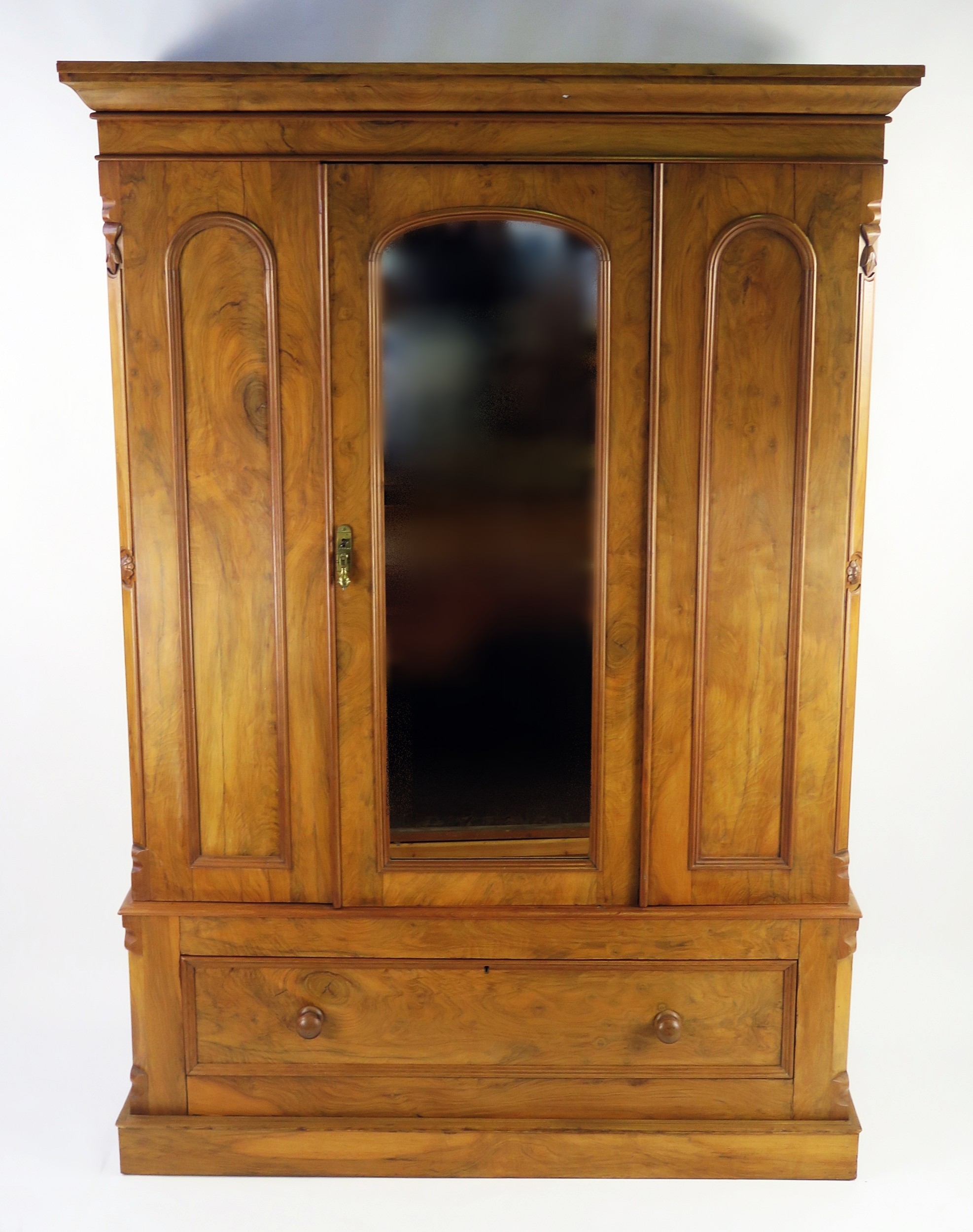 A late Victorian satin walnut wardrobe, of rectangular outline with ...