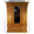 A late Victorian satin walnut wardrobe, of rectangular outline with ...