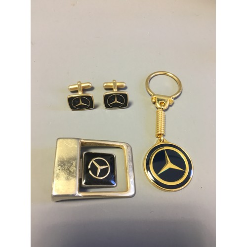 93 - Collection of Mercedes Presentation Merchandise. Cuff Links, Belt Buckle, Keyring etc