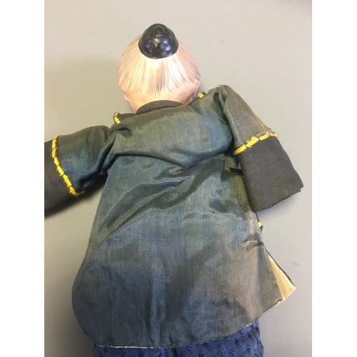 108 - Chinese Early 20th Century Pair of Ceramic and Cloth 