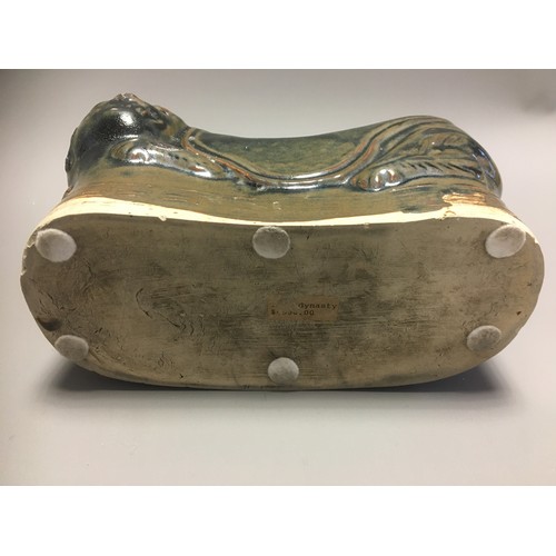 100 - Chinese - AN EARLY CHINESE BLACK GLAZED POTTERY PILLOW possibly Tang Dynasty, formed as a recumbent ... 