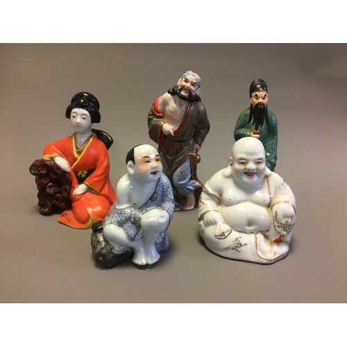94 - 5 x Oriental Figures - A Seated well modeled Buddha, Immortals etc.
