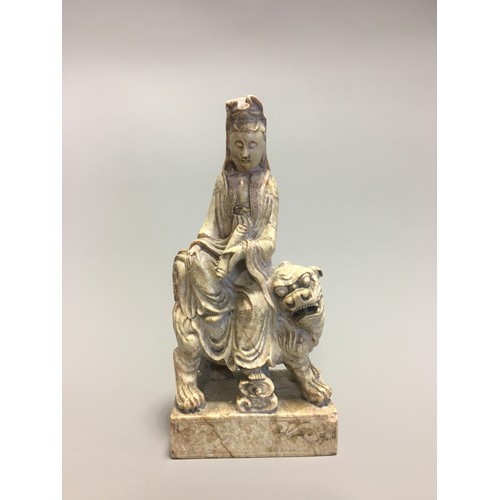 112 - Chinese well carved Soapstone Shi Hou Guanyin, Guanyin atop a Lion.H 18cm