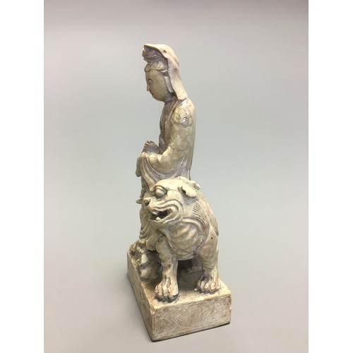 112 - Chinese well carved Soapstone Shi Hou Guanyin, Guanyin atop a Lion.H 18cm