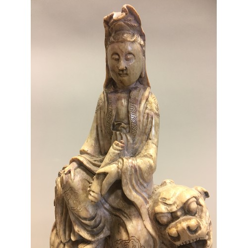 112 - Chinese well carved Soapstone Shi Hou Guanyin, Guanyin atop a Lion.H 18cm