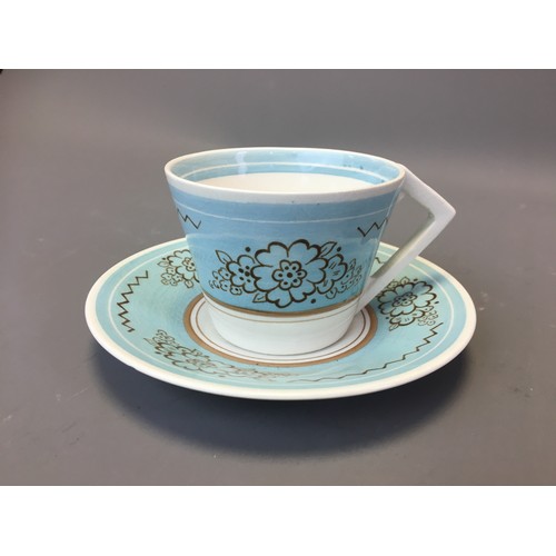 65 - Art Deco - Clarice Cliff for Wilkinson Blue and Floral Decorated Cup and Saucer.