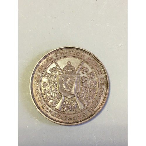 42 - A 1908 Dublin Civil Service Rifle Club Bronze Medallion and a collection of Vintage Cloth Shooting B... 