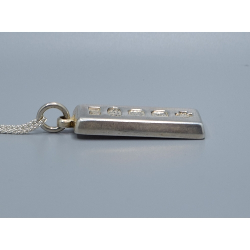 2509 - 925 silver fully hall marked Millennium Ingot held on a new without tag 925 silver neck chain 44cm l... 
