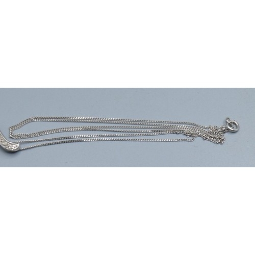 2512 - 9ct white gold Diamond scroll pendant necklace hallmarked as Diamond on a 9ct white gold neck chain ... 