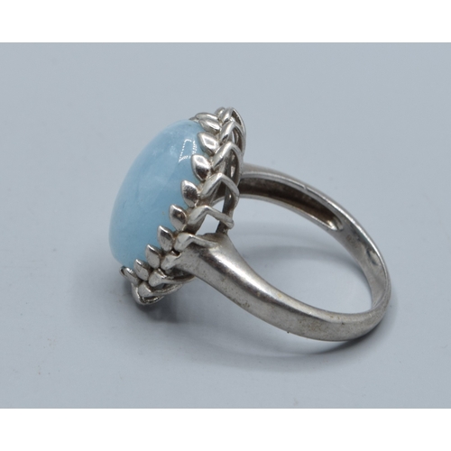 2528 - 925 silver ladies cabochon polished Amazonite dress ring held in a lural leaf setting size P
