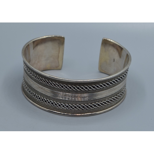 2529 - Good solid 925 silver ladies bangle with centre decoration and clear ends 6cm internal diameter, 2.5... 