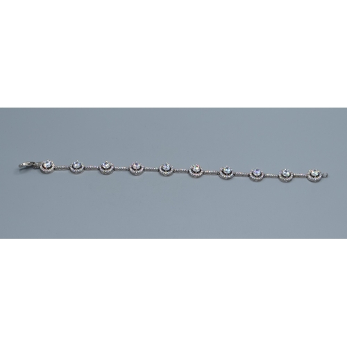 2537 - 925 silver ladies fancy link bracelet individual links being set with a clear gem stone halo and cle... 