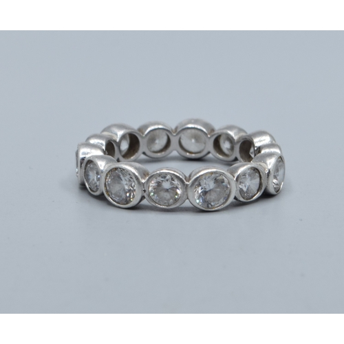2538 - 925 silver ladies full eternity ring set with clear stones, 5mm wide, 4mm deep size Q