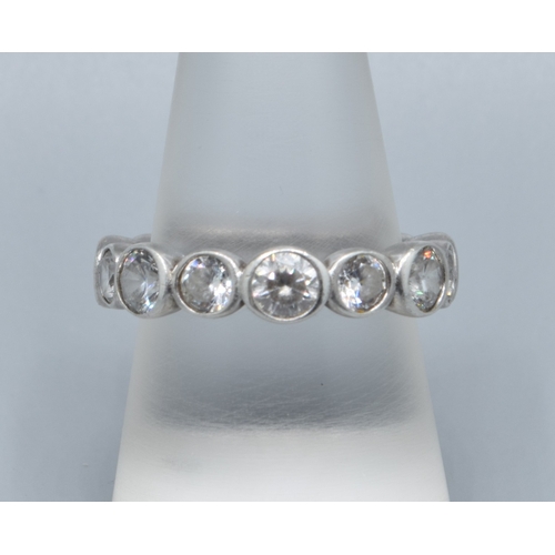 2538 - 925 silver ladies full eternity ring set with clear stones, 5mm wide, 4mm deep size Q