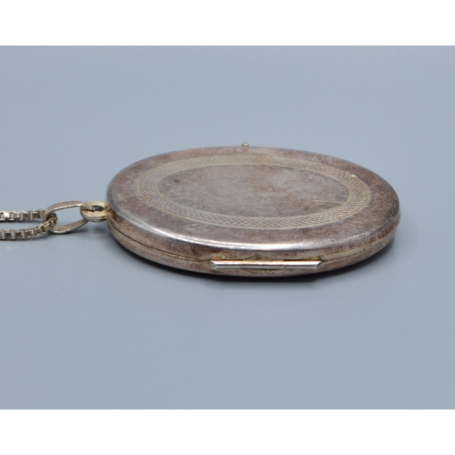 2539 - 925 silver picture locket pendant 4.1cm drop by2.8cm widest one side with machine decoration the rev... 