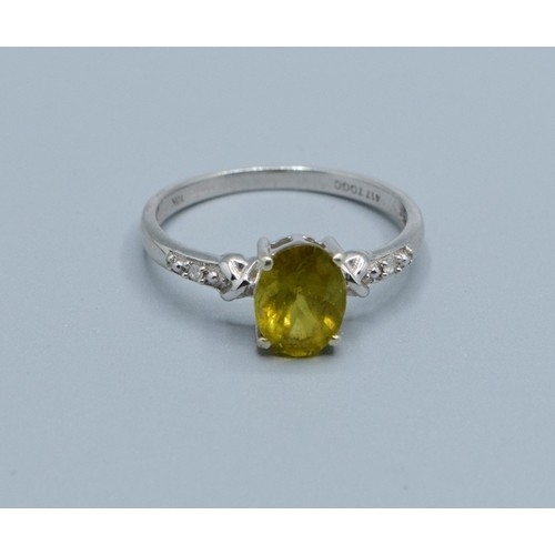 2545 - 9ct white gold ladies Peridot and Diamond dress ring the main stone being 8x6mm size N