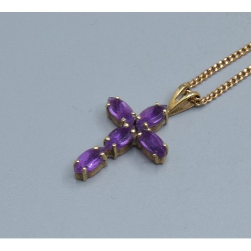 2553 - 9ct gold Amethyst cross measuring 2.3x1.3cm including the bale on a 9ct gold neck chain of 52cm long... 