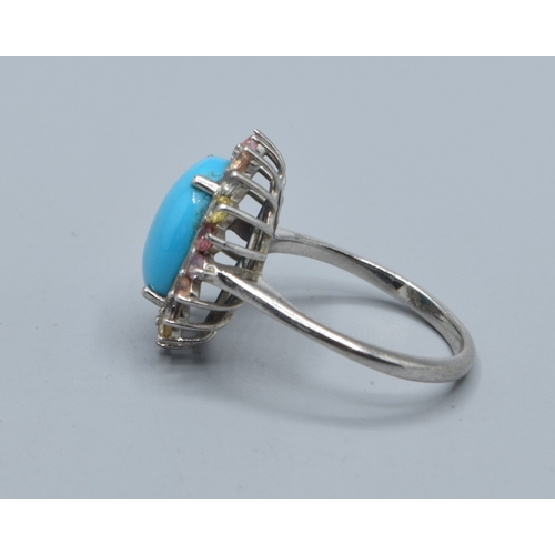 2580 - 925 silver ladies oval cabochon Turquoise halo design ring the halo being made up of multi coloured ... 