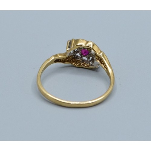 2582 - 9ct gold ladies vintage 3 stone Ruby and Diamond ring in a sweep design hallmarked as Diamond size P