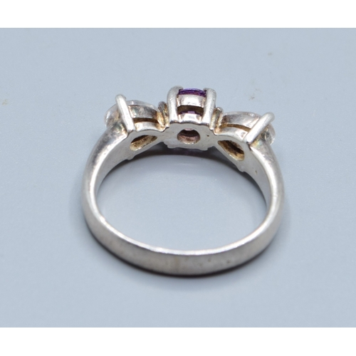 2586 - 925 silver ladies Amethyst centre flanked by twin tear drop design clear gem stones size M