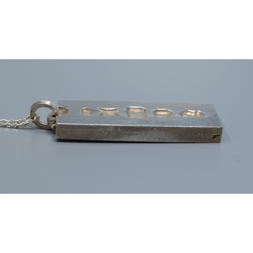 2599 - 925 silver fully hall marked 1 once Ingot held on a 925 silver neck chain 70cm long
