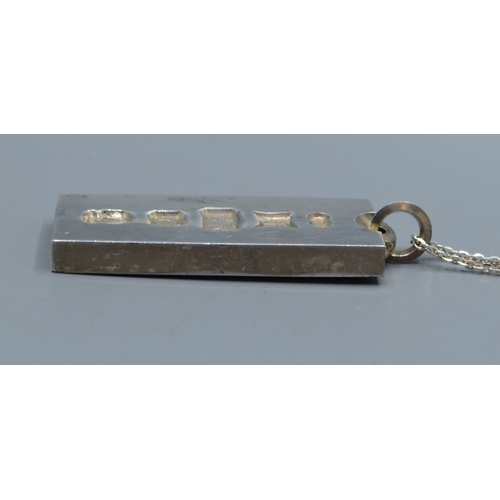 2599 - 925 silver fully hall marked 1 once Ingot held on a 925 silver neck chain 70cm long