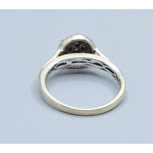 2602 - 9ct white gold (tested) ladies Diamond halo cluster ring the head size being 9.5mm diameter with an ... 