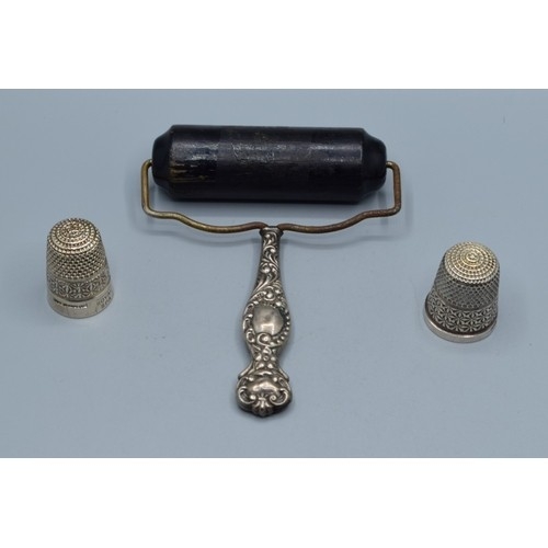 2610 - Two silver Thimbles and a silver topped antique blotter