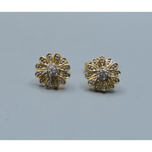 2615 - Pair of vintage 9ct gold and Diamond floral studs, 9mm diameter