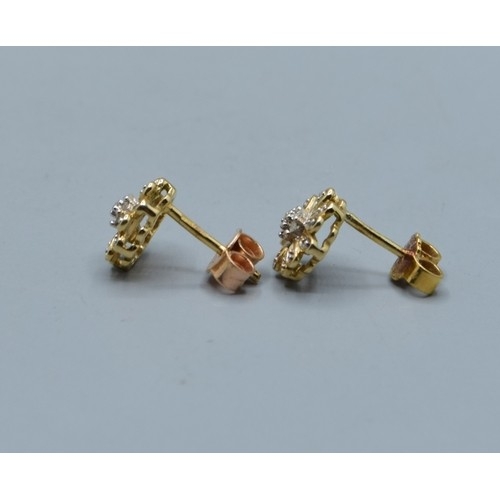 2615 - Pair of vintage 9ct gold and Diamond floral studs, 9mm diameter